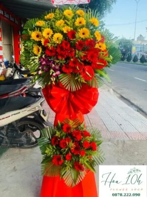 Kệ Hoa Khai Trương Đại Cát tông màu đỏ vàng rực rỡ