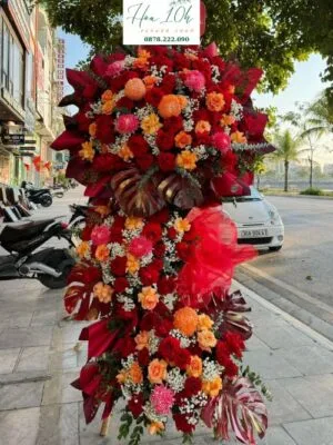 Kệ hoa chúc mừng 3 tầng tông màu đỏ cam rực rỡ