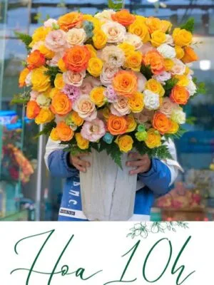 Bình hoa tông màu vàng cam mix hồng đẹp đầy đặn